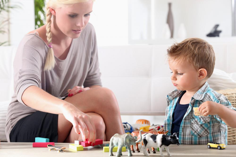 stay at home mom playing with her toddler
